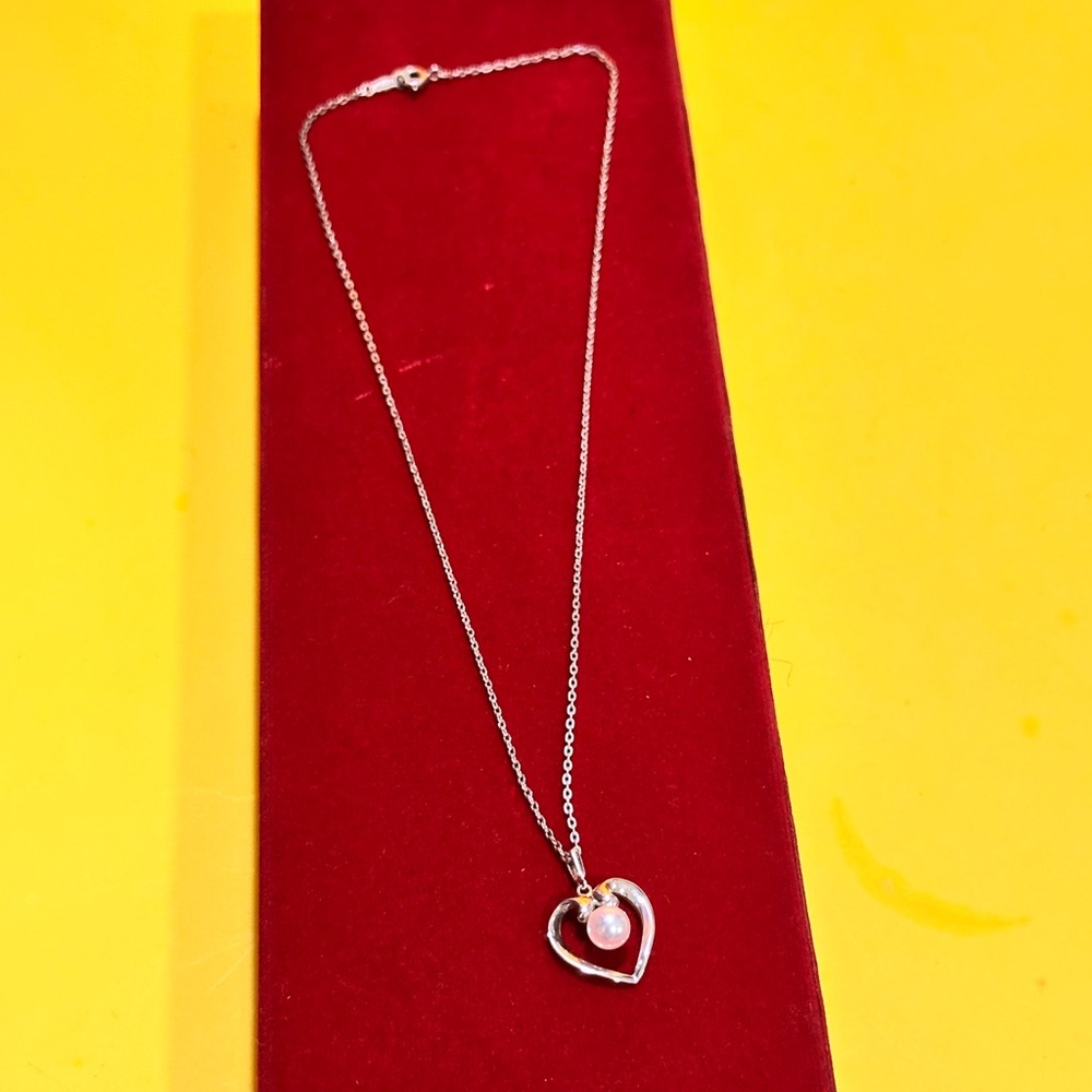 Mikimoto Silver Heart Necklace with Pearl
925 silver made. - Picture 1 of 12